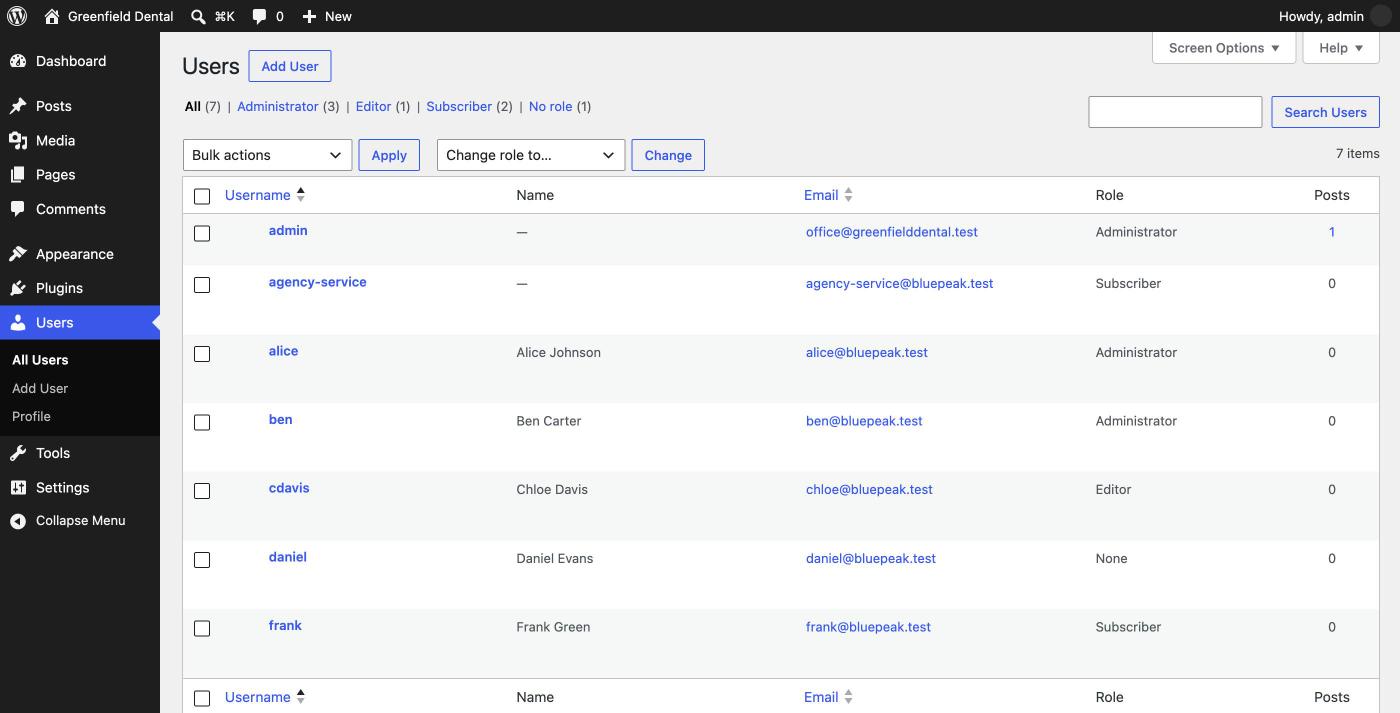 A suspended account shows no role in the Users screen